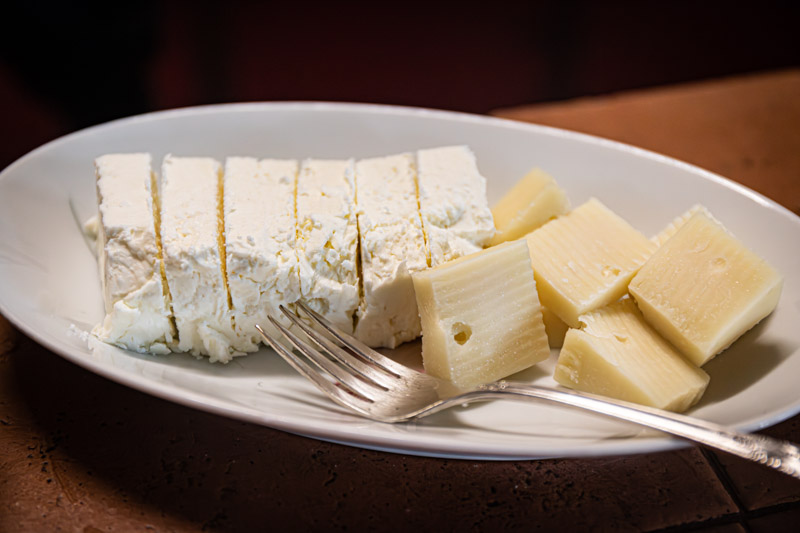 plate of feta and hard cheese