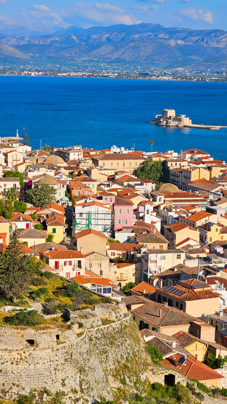 aerial view of old town nafplio by the sea with bourtzi castle in the water