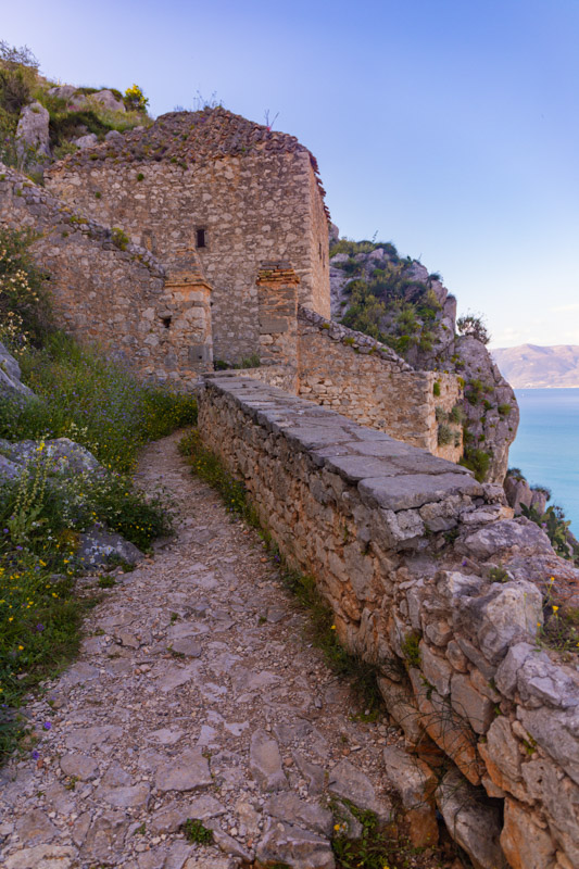 cobblestone path leading up to ruins