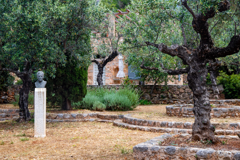 statue pf patrick fermor and olive tree