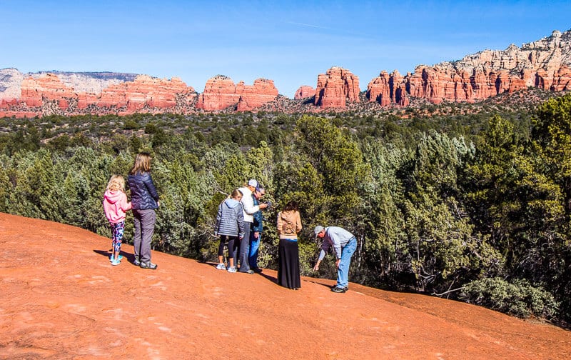 tour group looking at fossils Braoken Arrow Pink Jeep Tour, Sedona