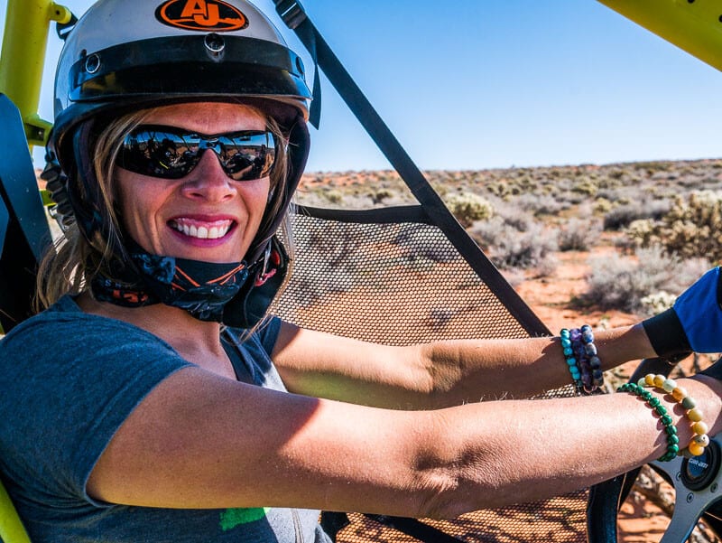 woman wearing sunglasses and a helmet