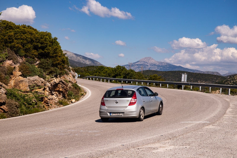 car driving through the mountains