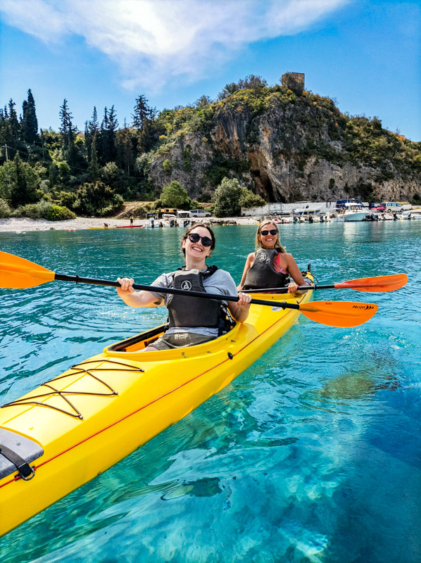 two girls in kayak smiling