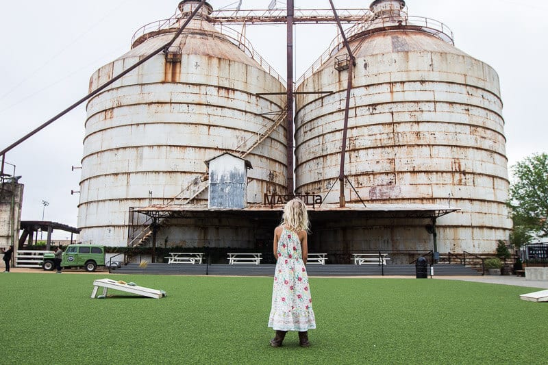 savannah standing in front of silos 