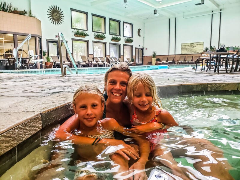 family in resort spa posing to camera