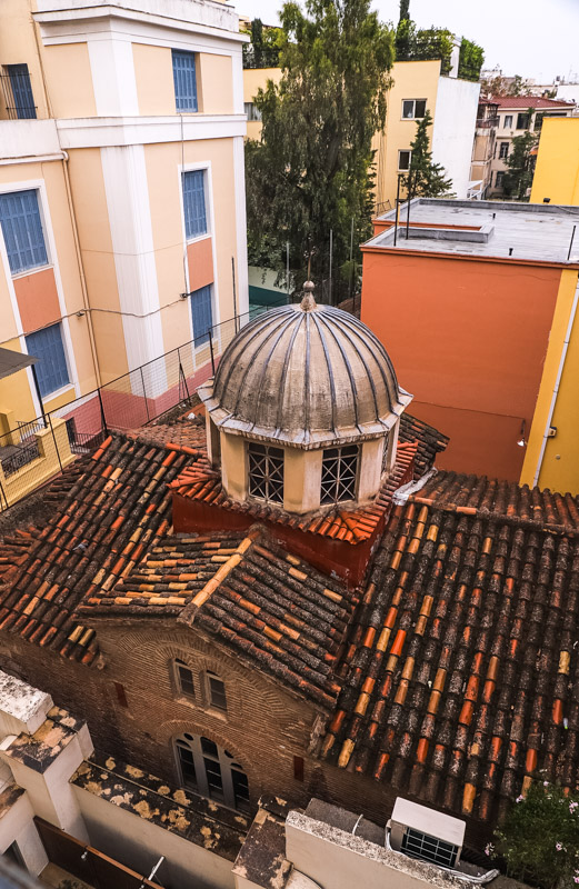 view of church squashed between buildings