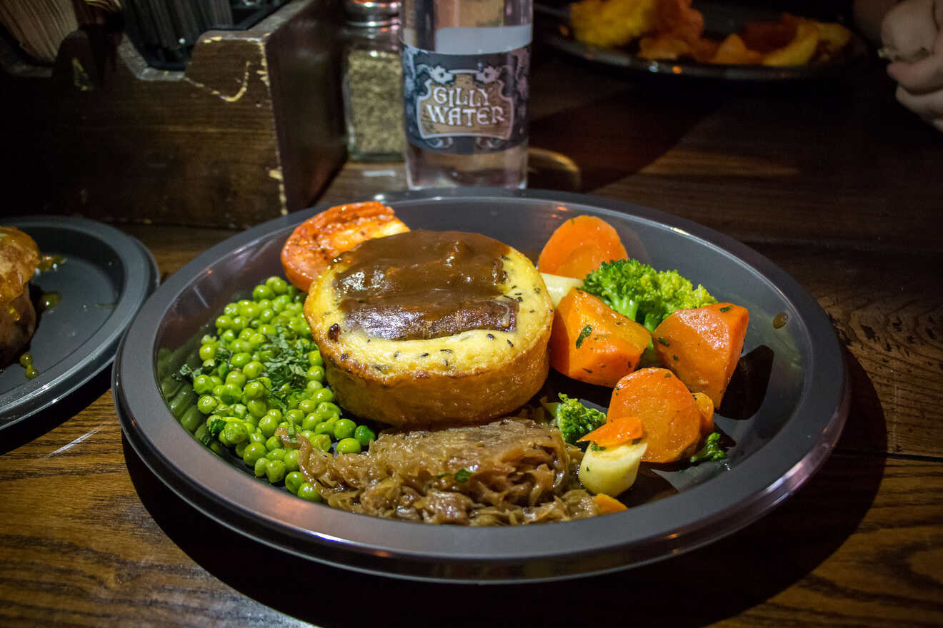 A plate of food with meat and vegetables