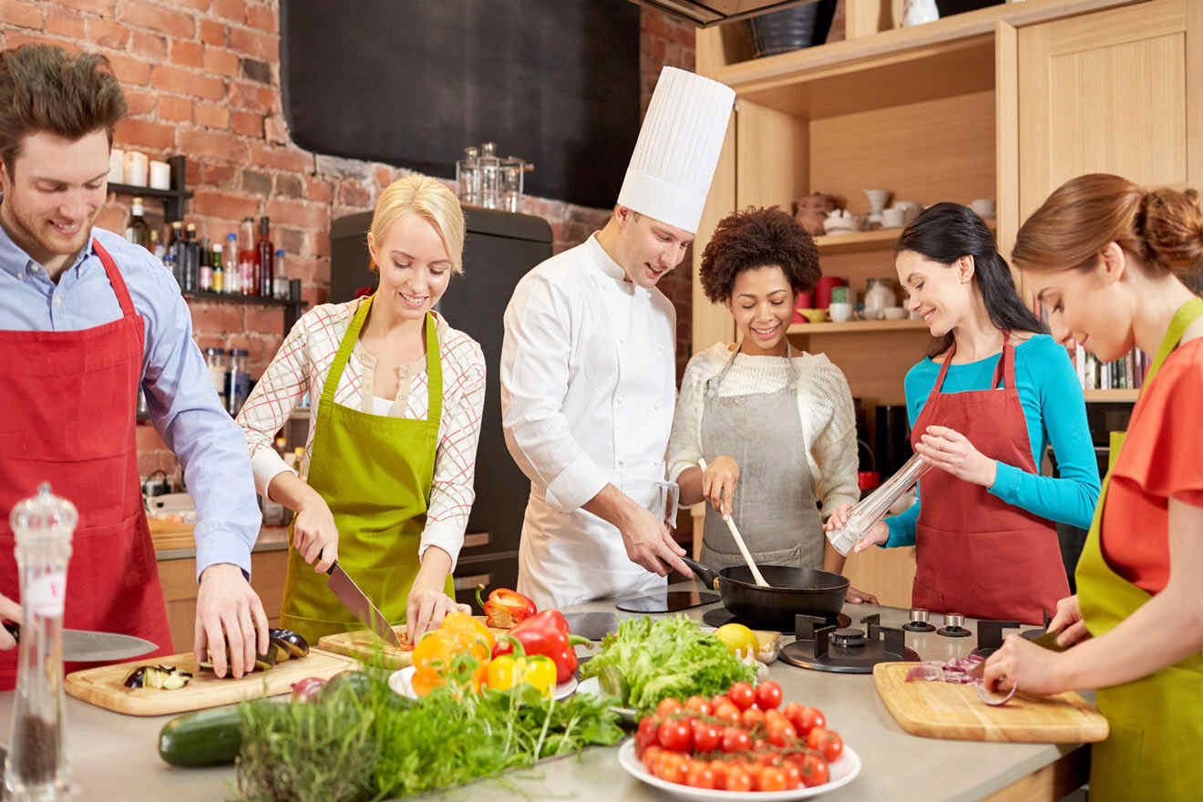 chef teaching students how to cook