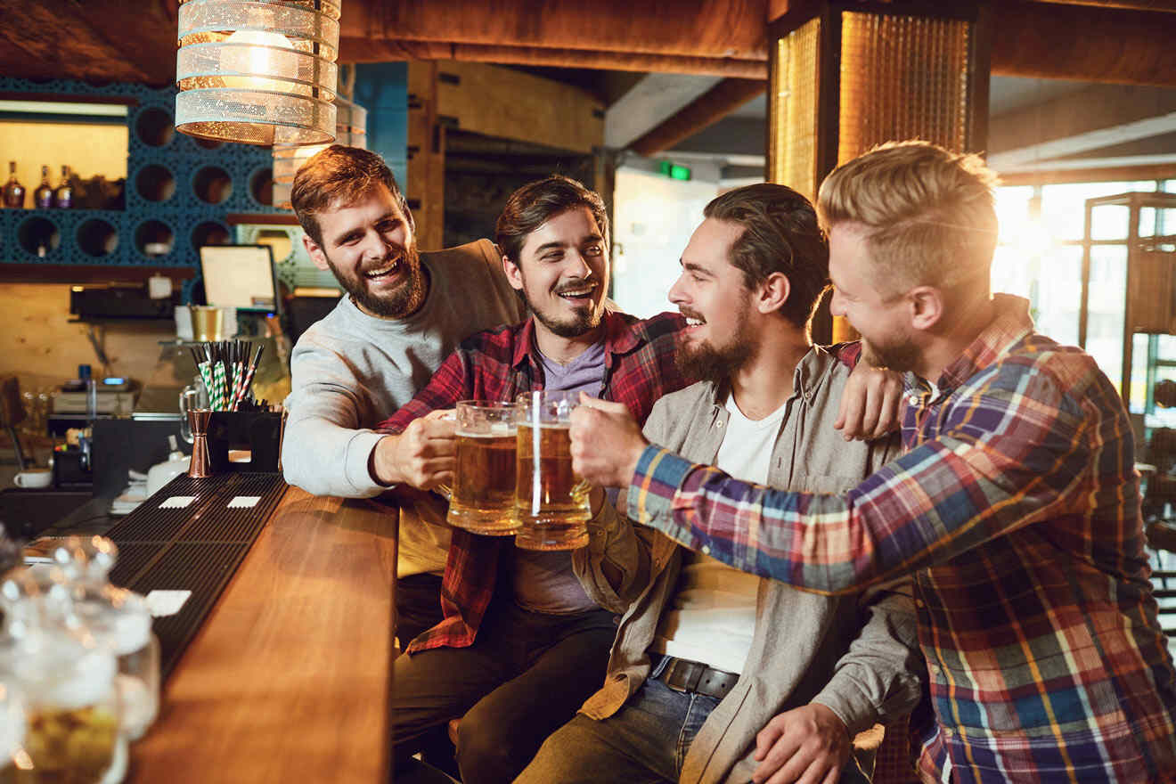 group of friends having a beer at a pub