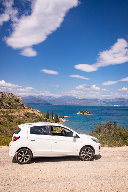 car next to coastline