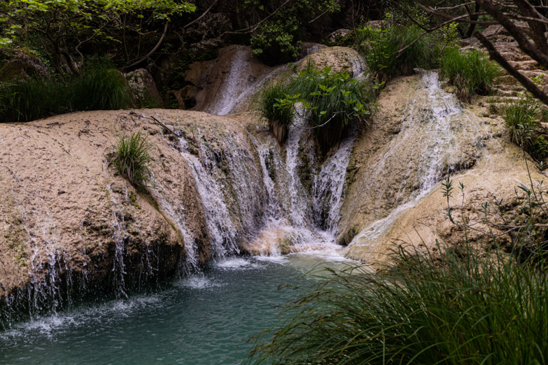 waterfalls trickling over rocks