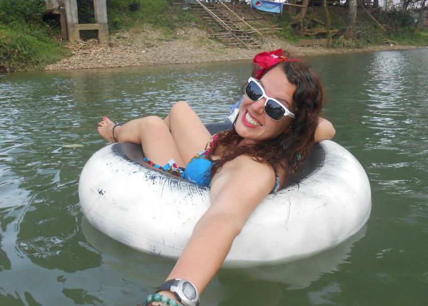 girl in tube smiling