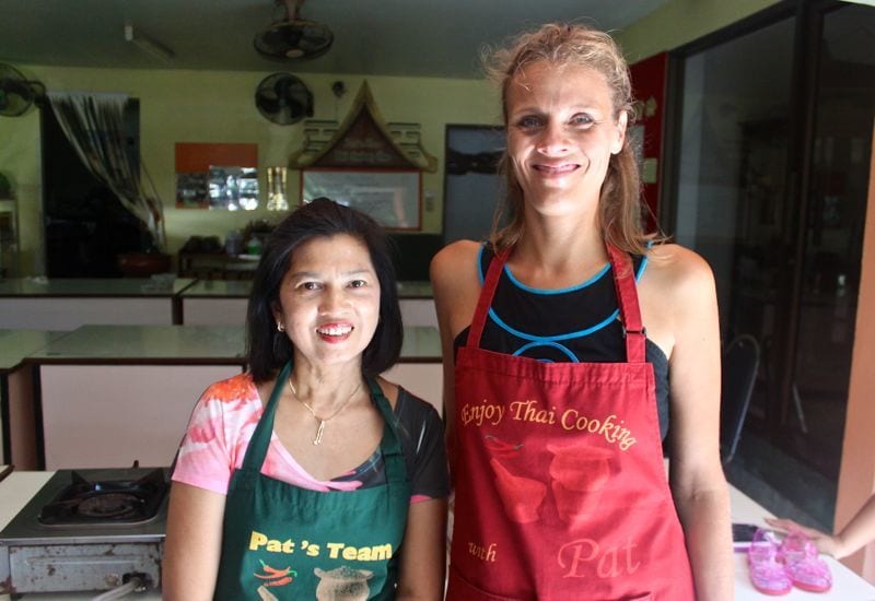 women wearing aprons