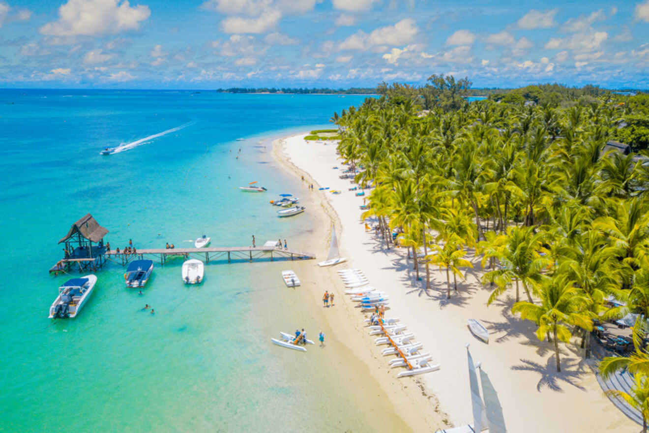 aerial view over the beach and pier