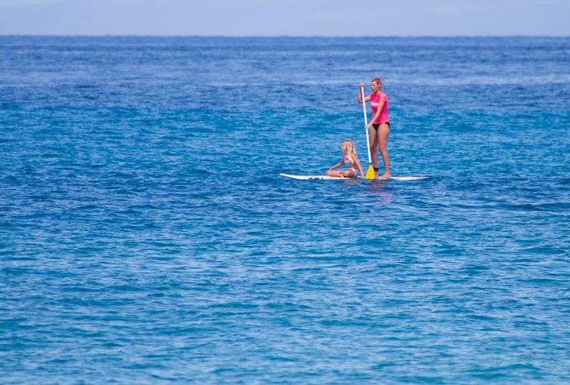 caz and kalyra Stand up paddle boarding at Kaanapali Beach, Maui, Hawaii