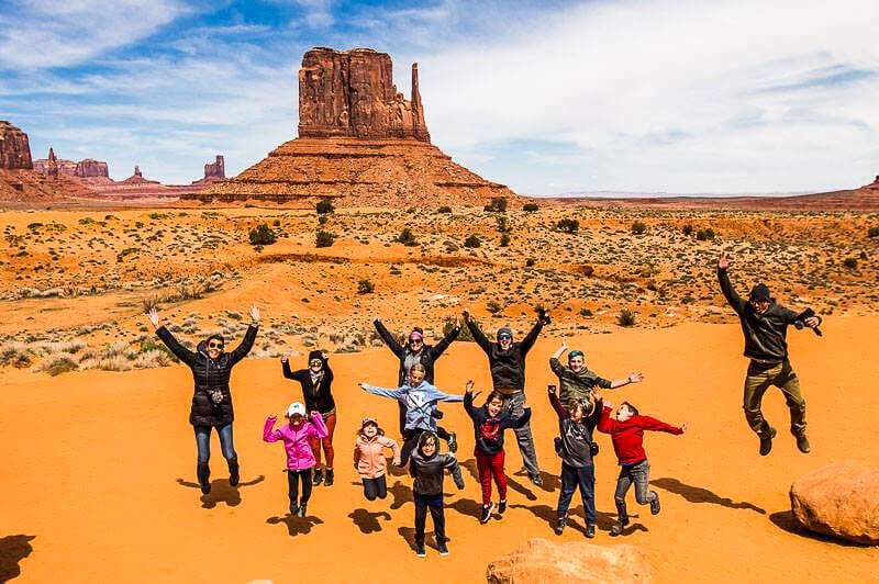 people Jumping at Monument Valley 