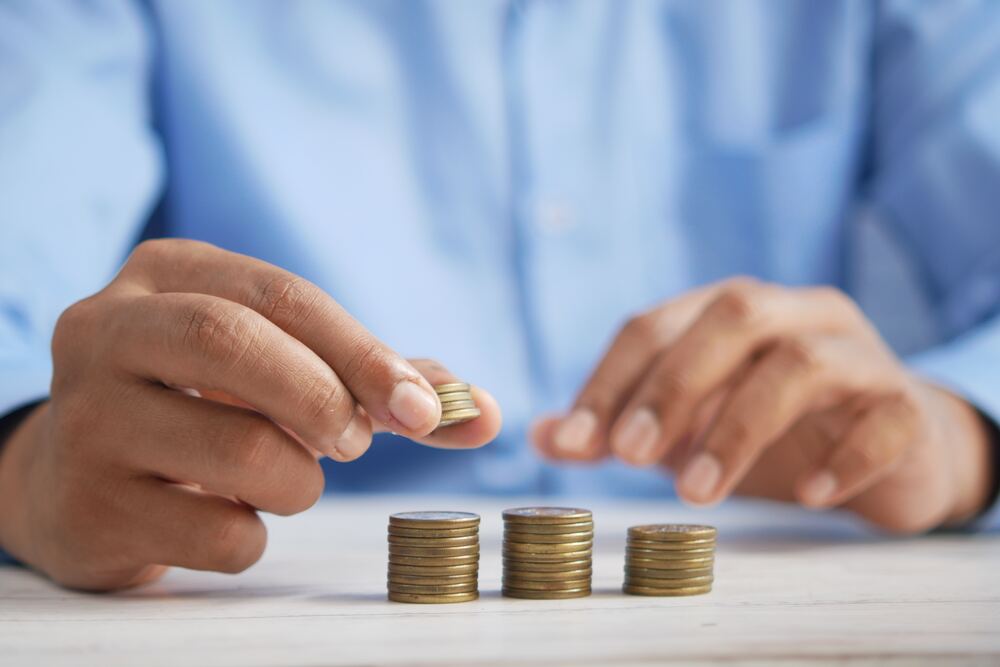 man counting coins