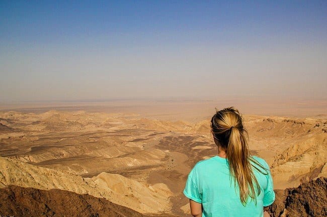 woman looking at a canyon