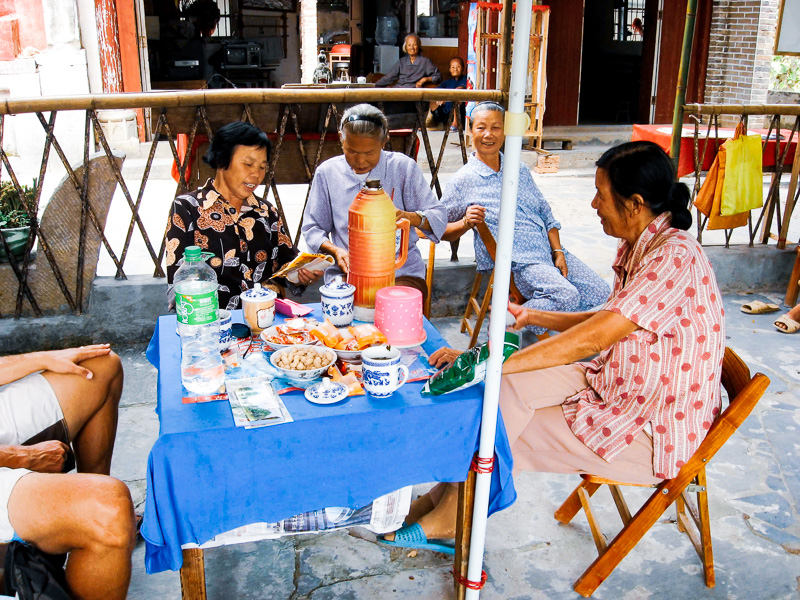 group of people talking at table