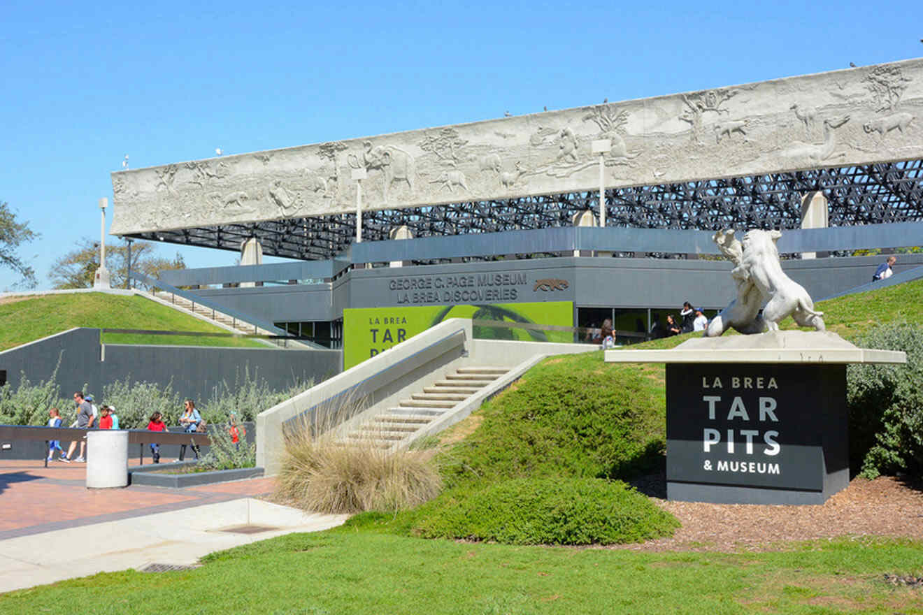 a statue of a horse is in front of a museum