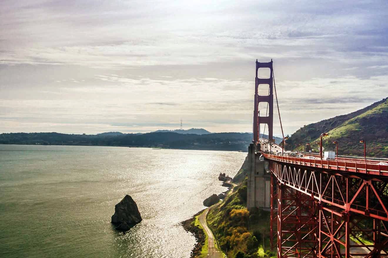 a view of the golden gate bridge from the top of a hill