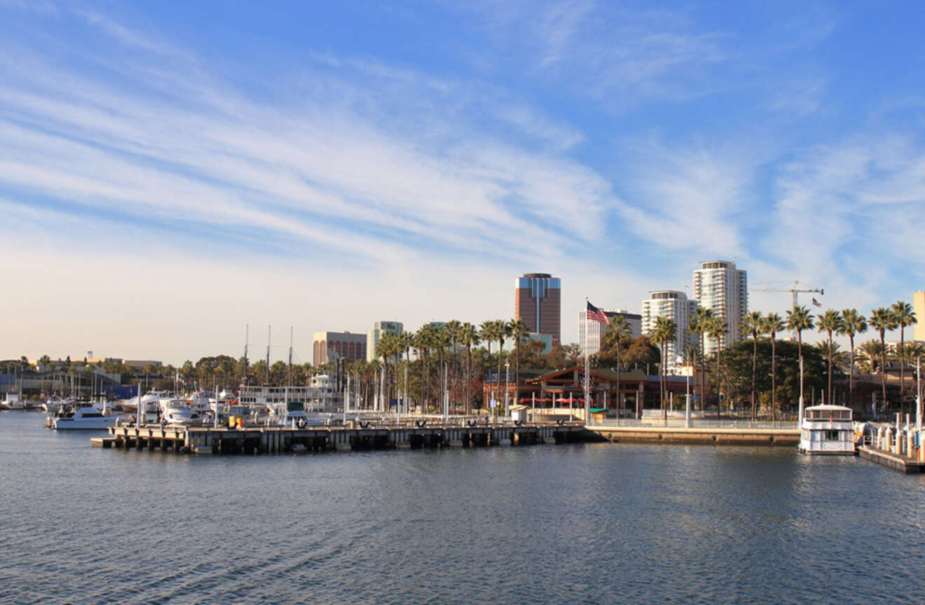 a harbor filled with lots of boats under a blue sky