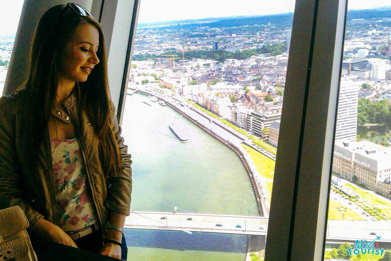 A girl looking out at the view from the Rhine tower