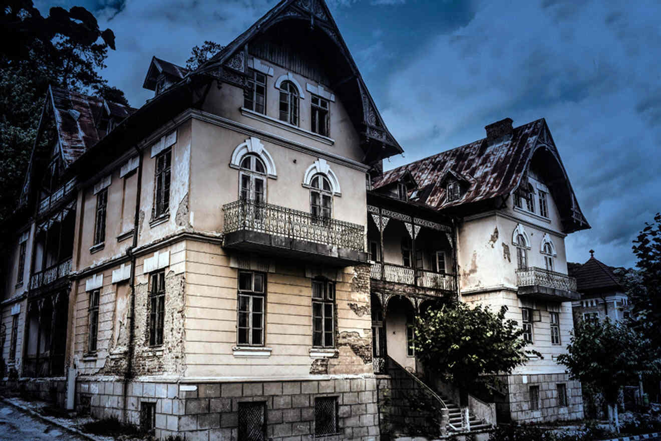 a very old house with a lot of windows and balconies