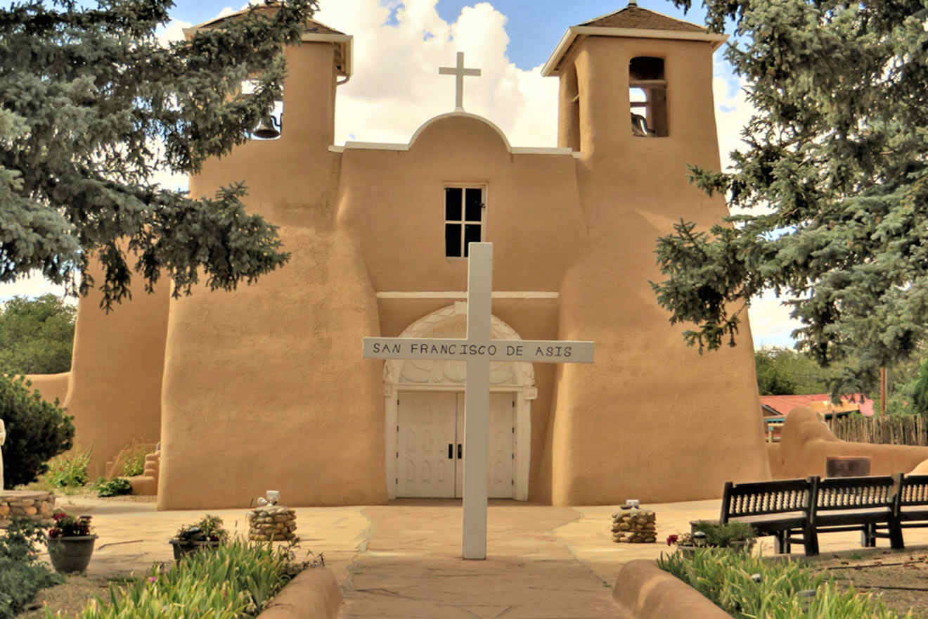 a church with a cross in front of it