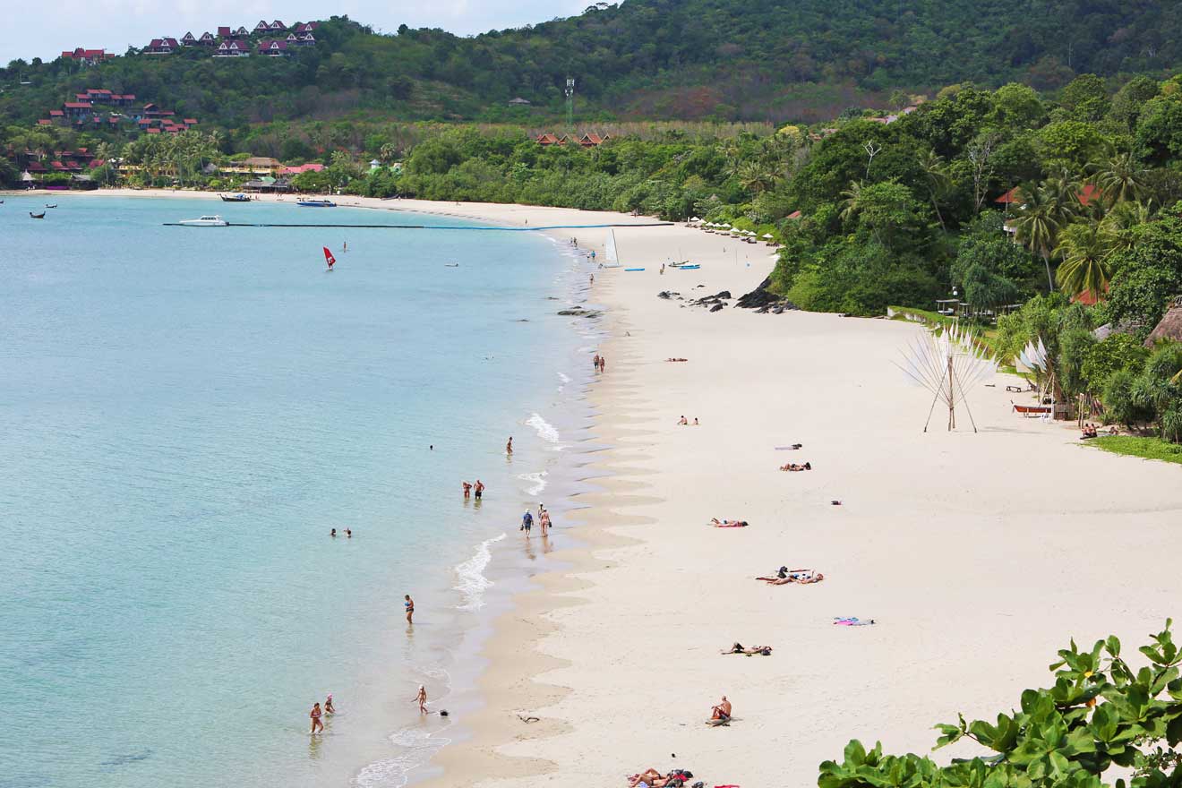 a beach with people on it