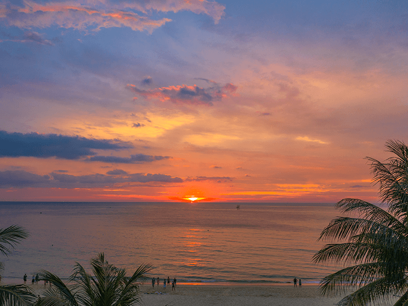 A sunset over a body of water