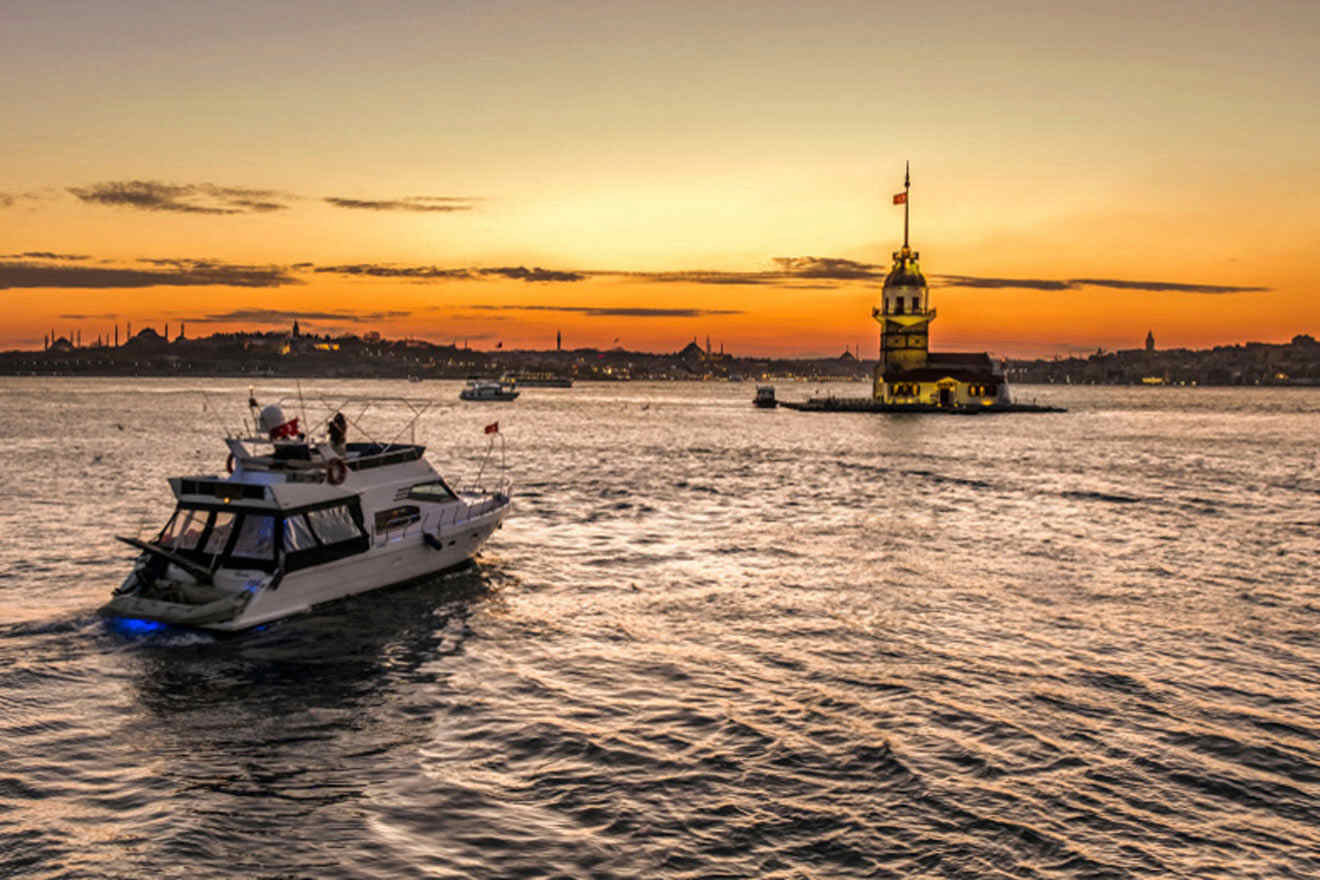 a boat in the water at sunset