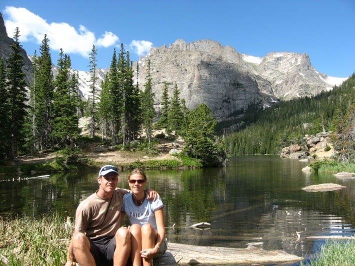 caz and craig cuddling in front of mountains