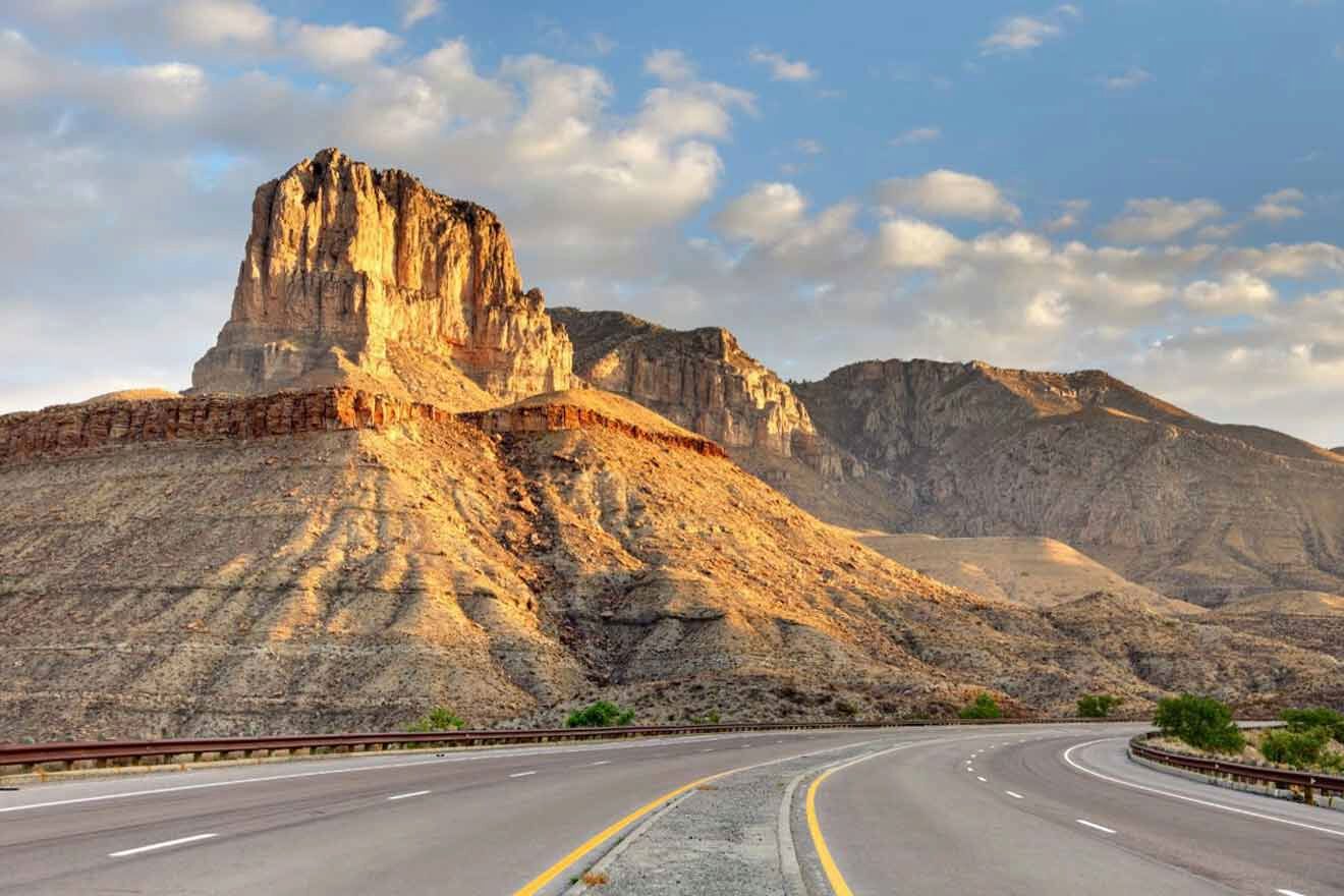 a road with a mountain in the background