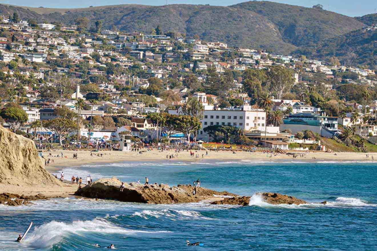 a view of a beach with a city in the background