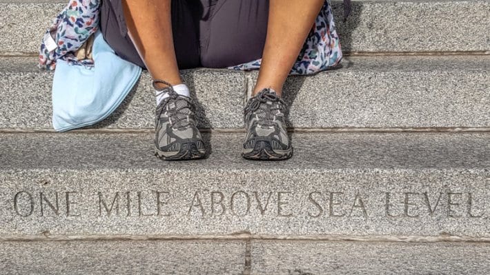 feet above mile high city sign