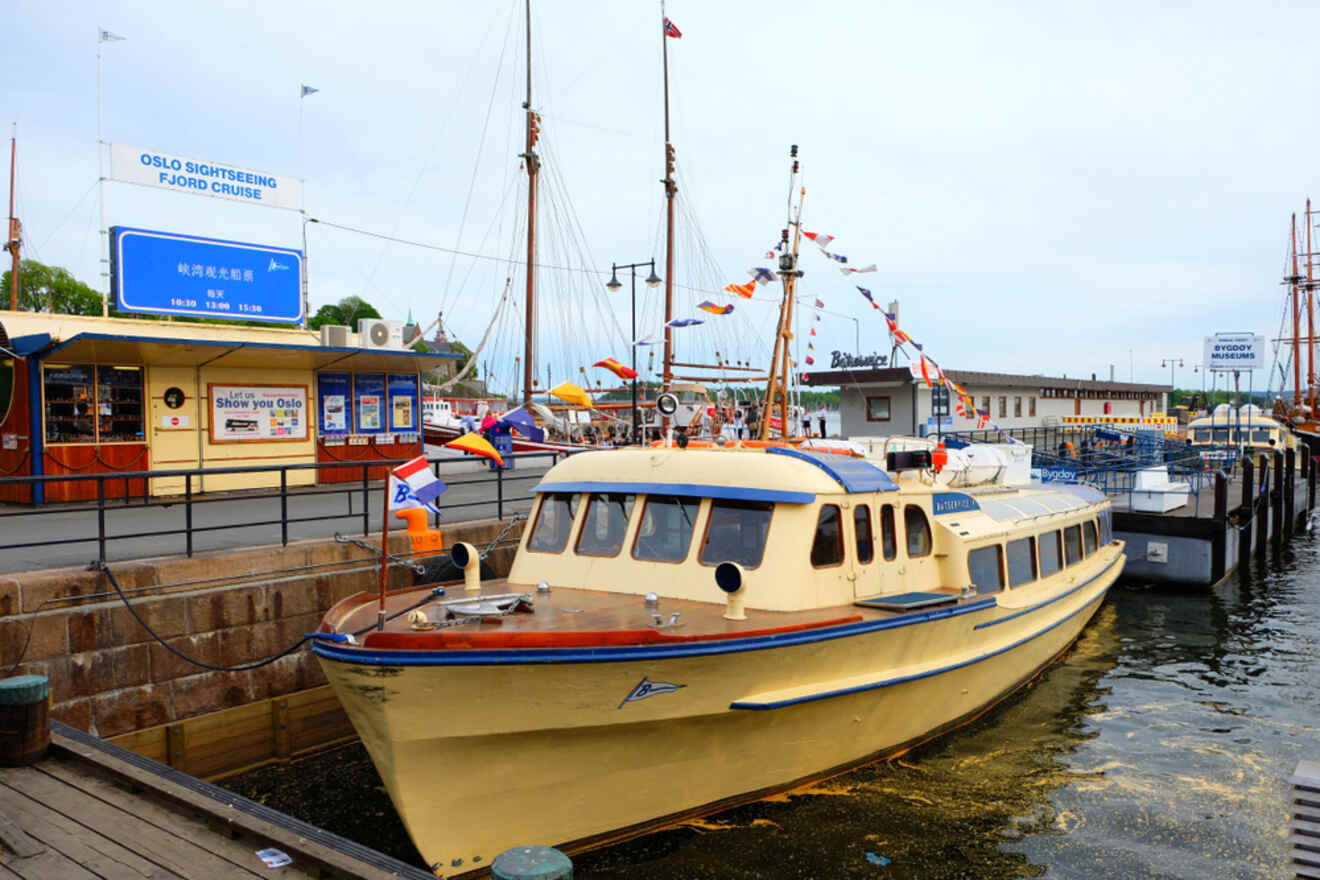 yellow boat docked in the harbor