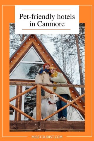 A couple with a dog standing on a balcony