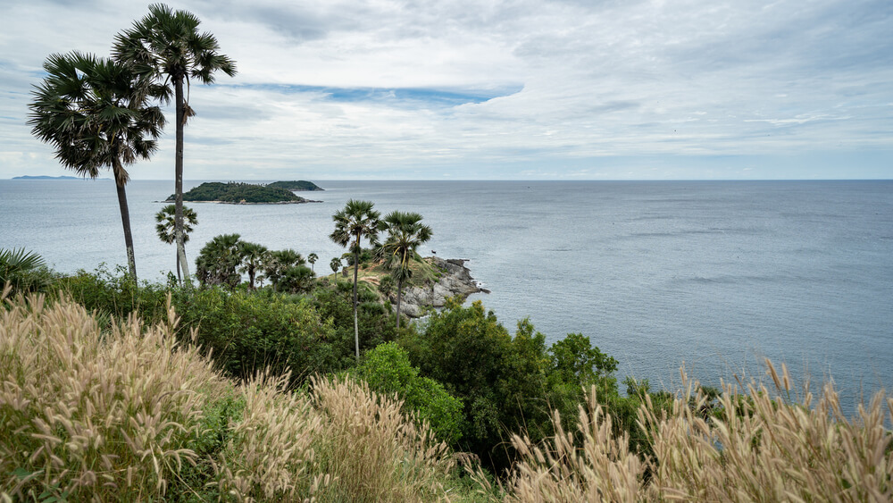 rocky headland of Promthep Cape with islands 