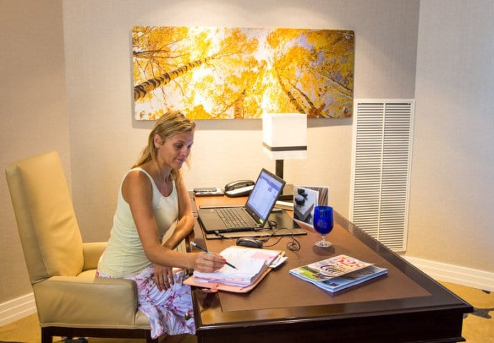 woman using a computer on a desk