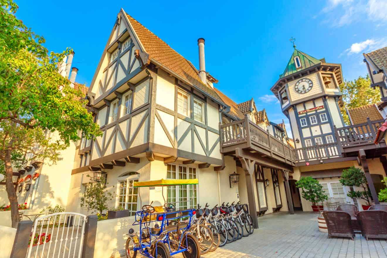 a row of bikes parked in front of a building