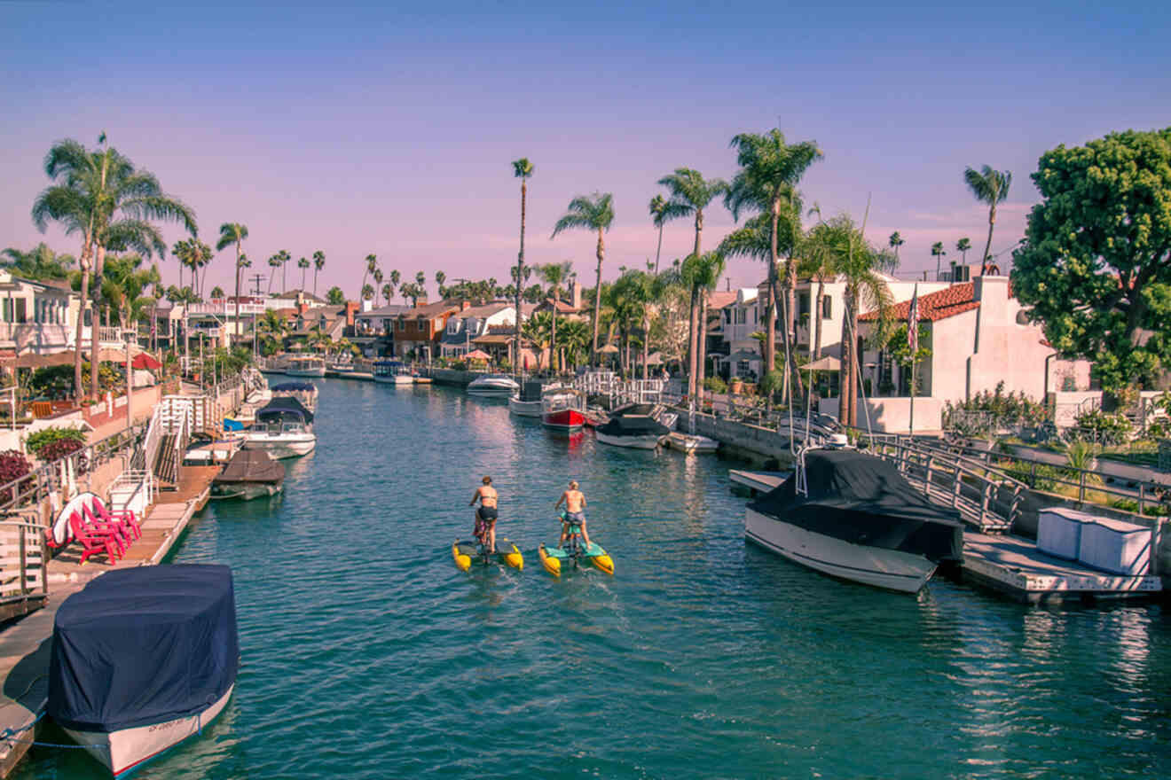 People riding motorboats at the canal in Naples Island