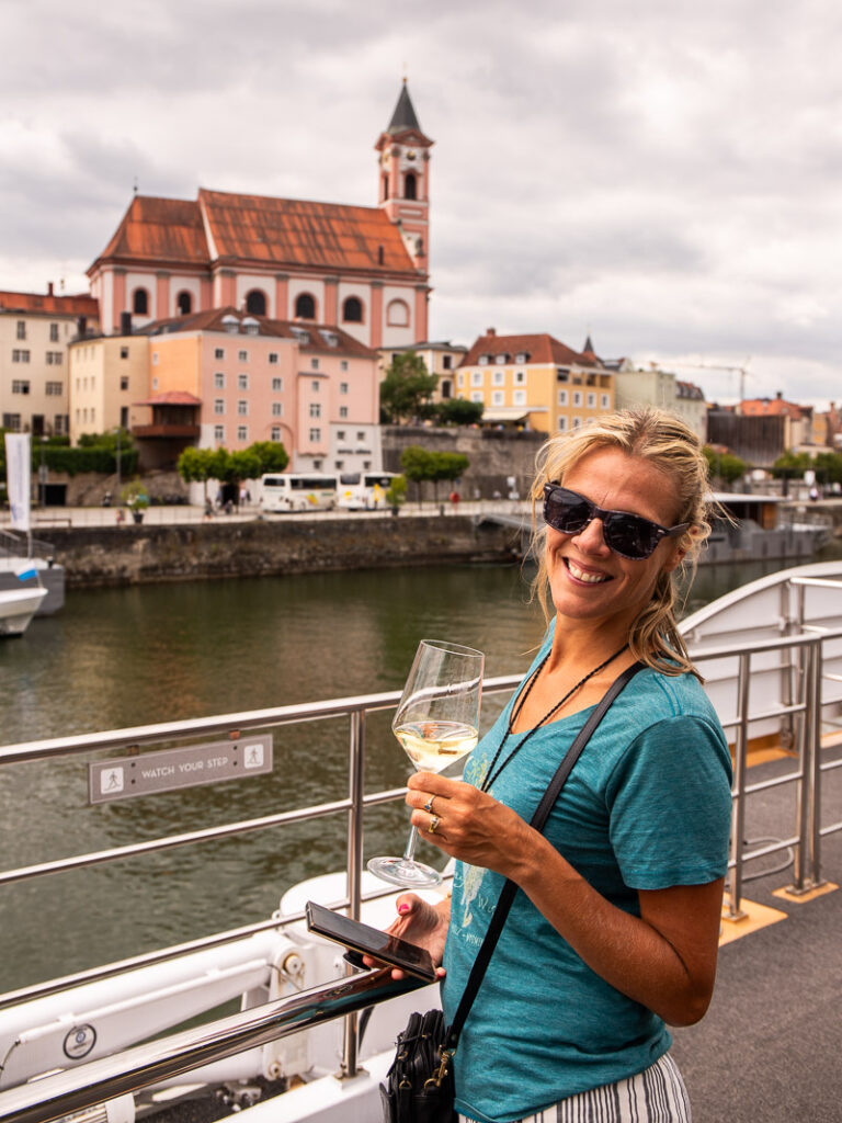 Lady drinking wine on a cruise ship