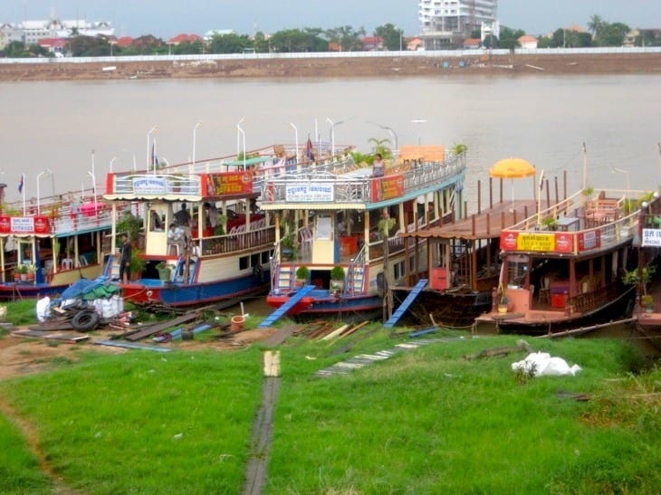 A boat parked on the grass