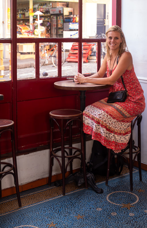 caz sitting at high top inside l'etoile de montmartre