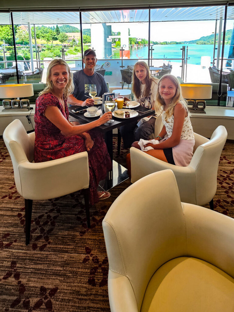 Family of four sitting at a table