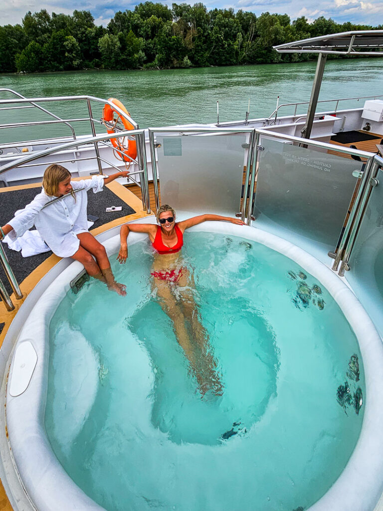 Mom and daughter enjoying a hot tub