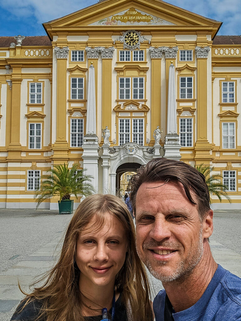 Dady and his daughter in front of an abby