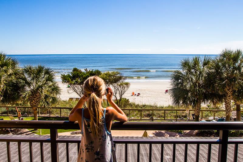 kalyra taking a photo of  Myrtle Beach, from hotel deck